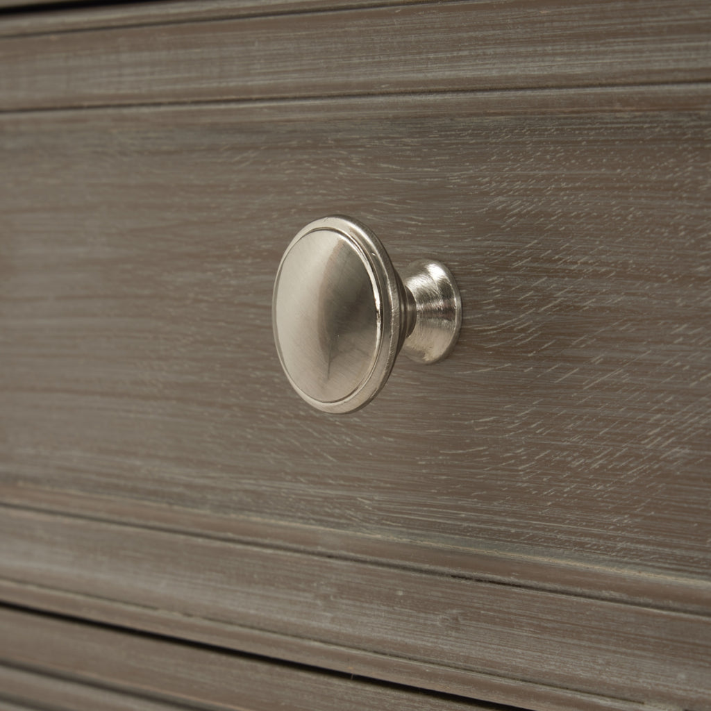 Close-up of the silver knob on the Serene side table drawer