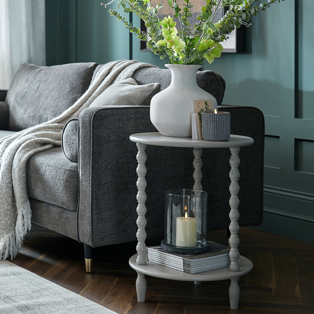 Camden round side table styled beside a sofa
