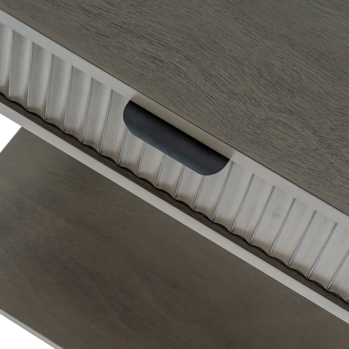 Close-up of the fluted drawer front and recessed handle