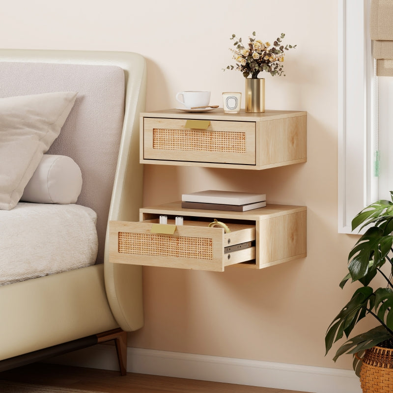 Wall-mounted rattan drawer cabinets beside a bed, one with drawer open