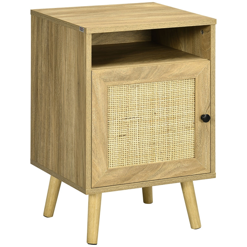 Natural wood bedside table with rattan door panel, open top shelf and tapered legs on a white background
