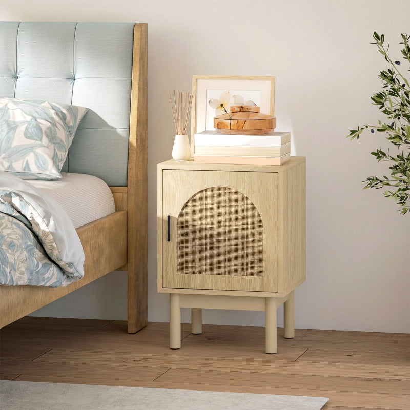 Arched rattan door bedside table beside a bed