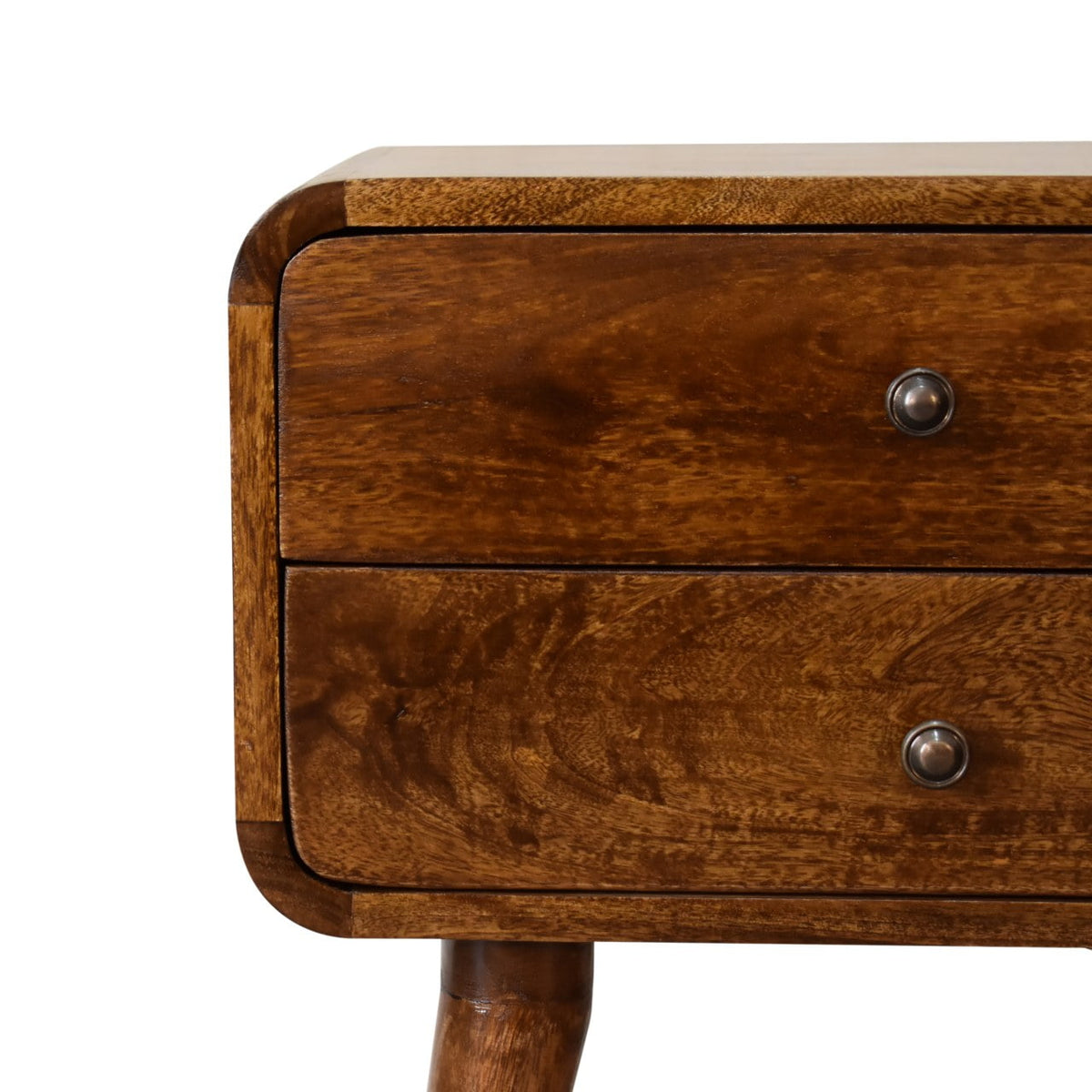 Close-up of the two drawers and round knobs on the curved chestnut bedside