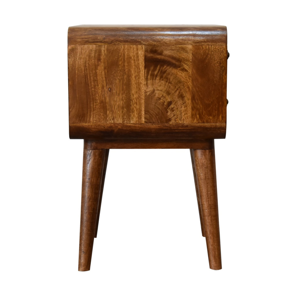 Side view of the curved chestnut bedside table