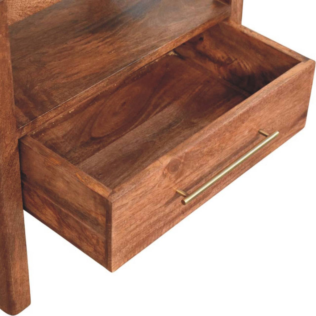 Rattan nightstand drawer pulled open with slim brass handle