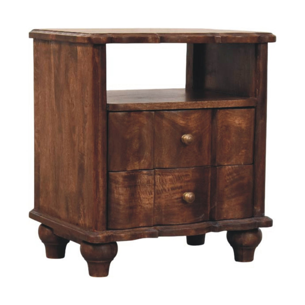 Wide bedside table with open shelf and two serpentine drawers, three-quarter view showing the side panel and turned feet