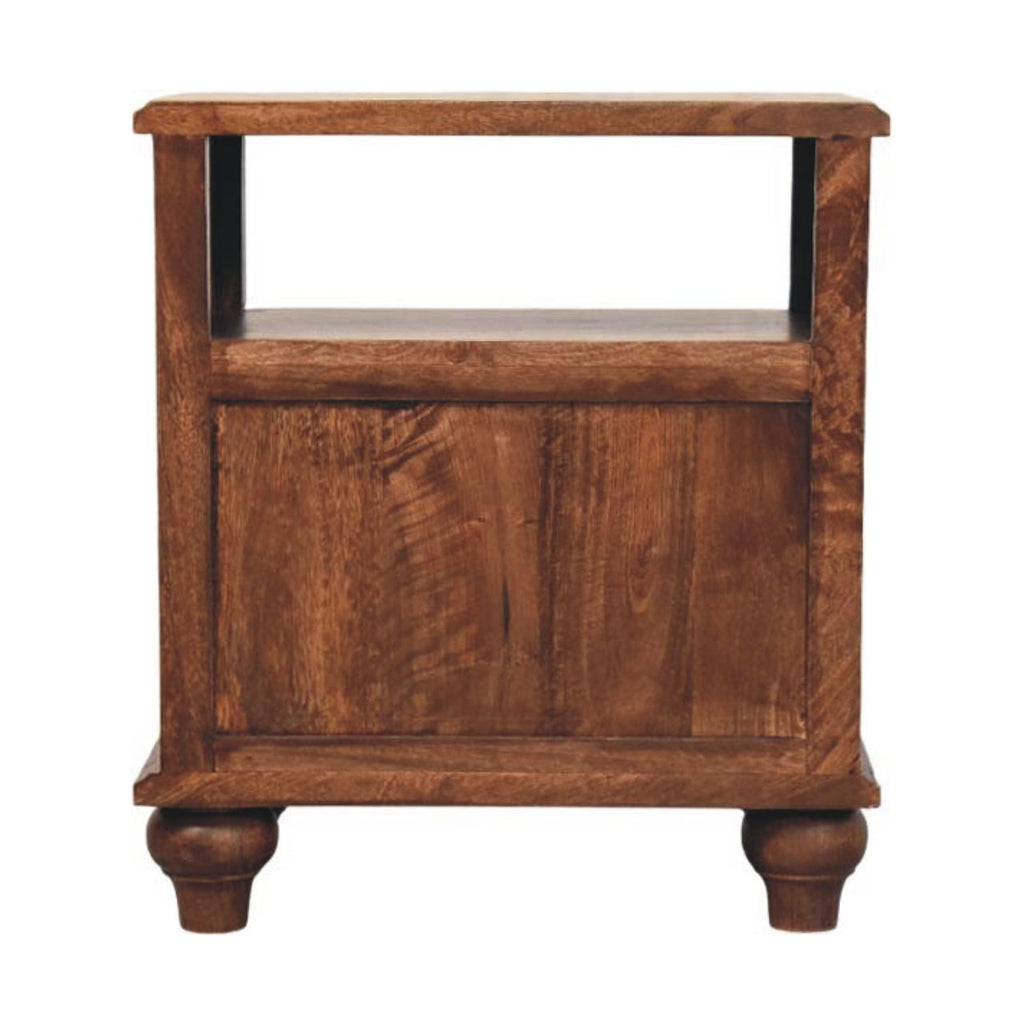 Back view of the brown bedside table with the open shelf and a framed panelled back under it