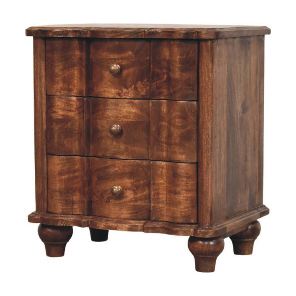 Three-drawer bedside table with serpentine front, three-quarter view showing the side panel and turned feet