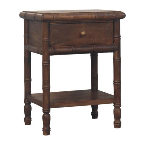 Dark brown bedside table with bamboo-style turned legs, one drawer with a brass knob and an open lower shelf, three-quarter view