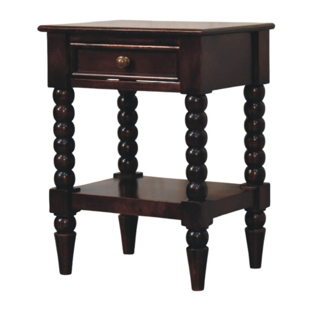 Dark wine-brown bedside table with one drawer and open lower shelf, three-quarter view showing the four turned legs
