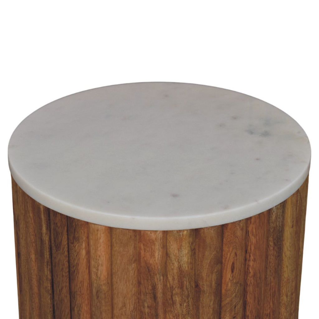 Marble top and upper fluted body of the side table, raised view