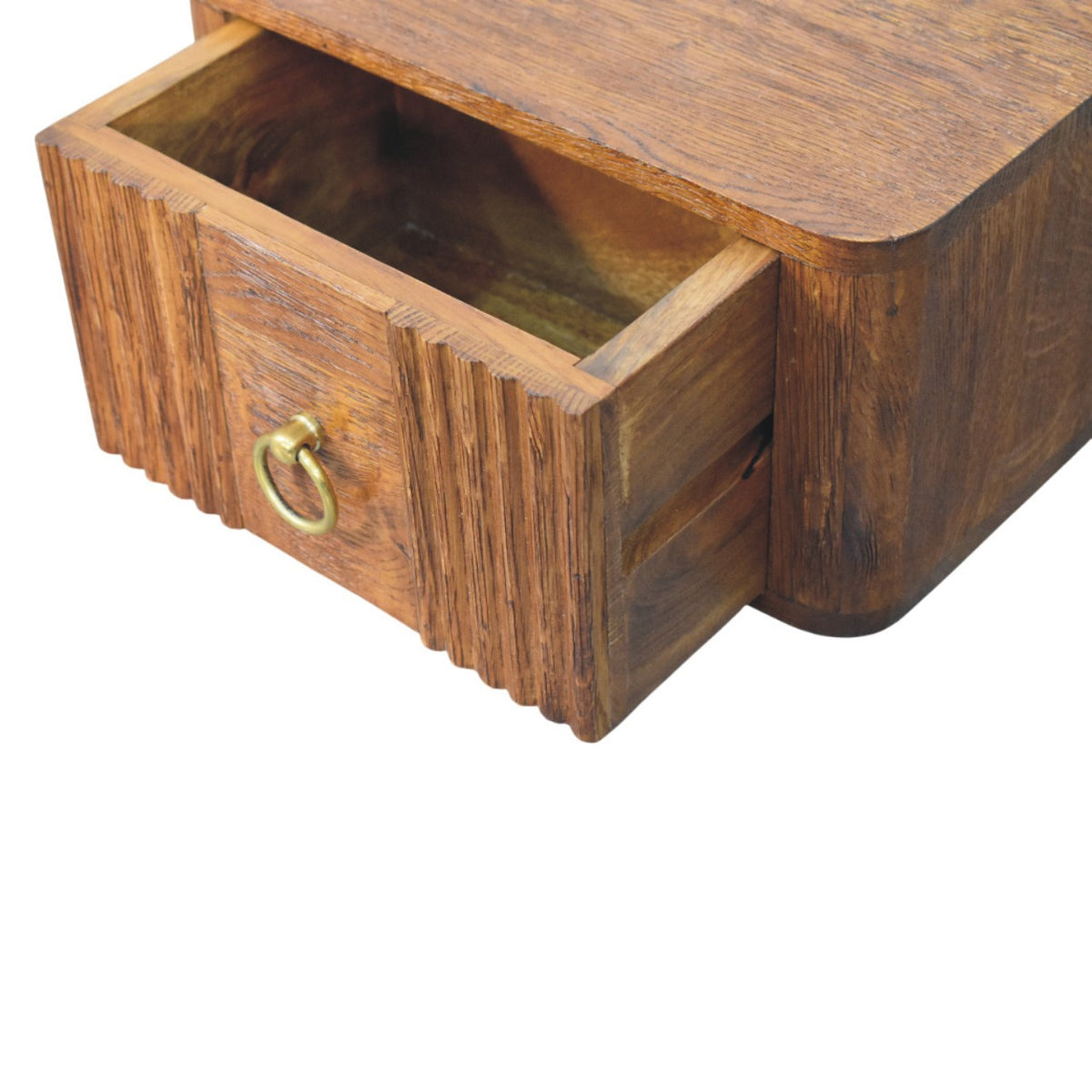 Drawer of the Wey 35 cm oak floating bedside table pulled out, reeded drawer front