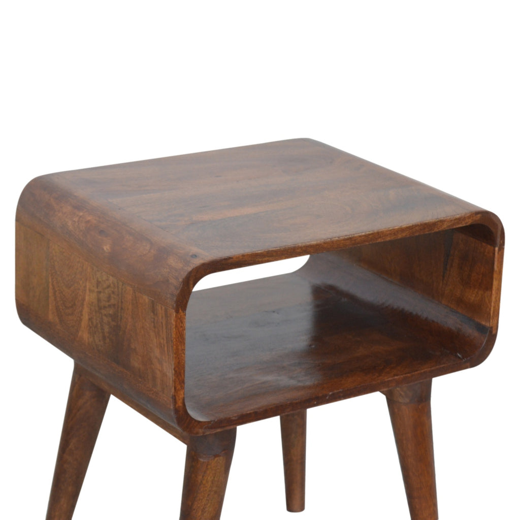 Bedside table with open shelf in chestnut brown, close-up of the rounded corners and shelf