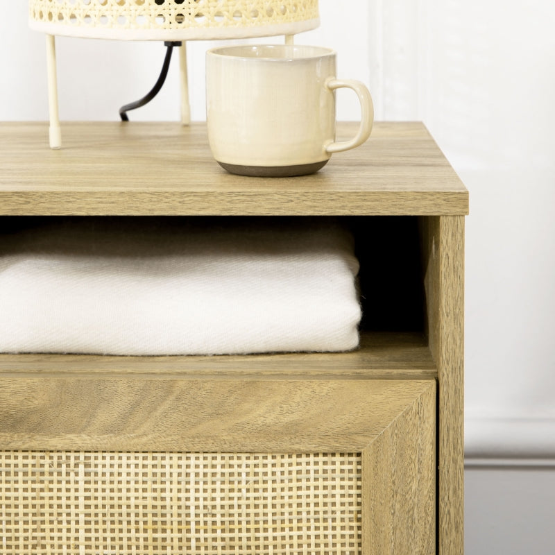 Close-up of the open shelf and rattan door of the bedside table