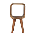 Narrow open bedside table, 20 cm wide, light oak-look wood, front view of the open cube design