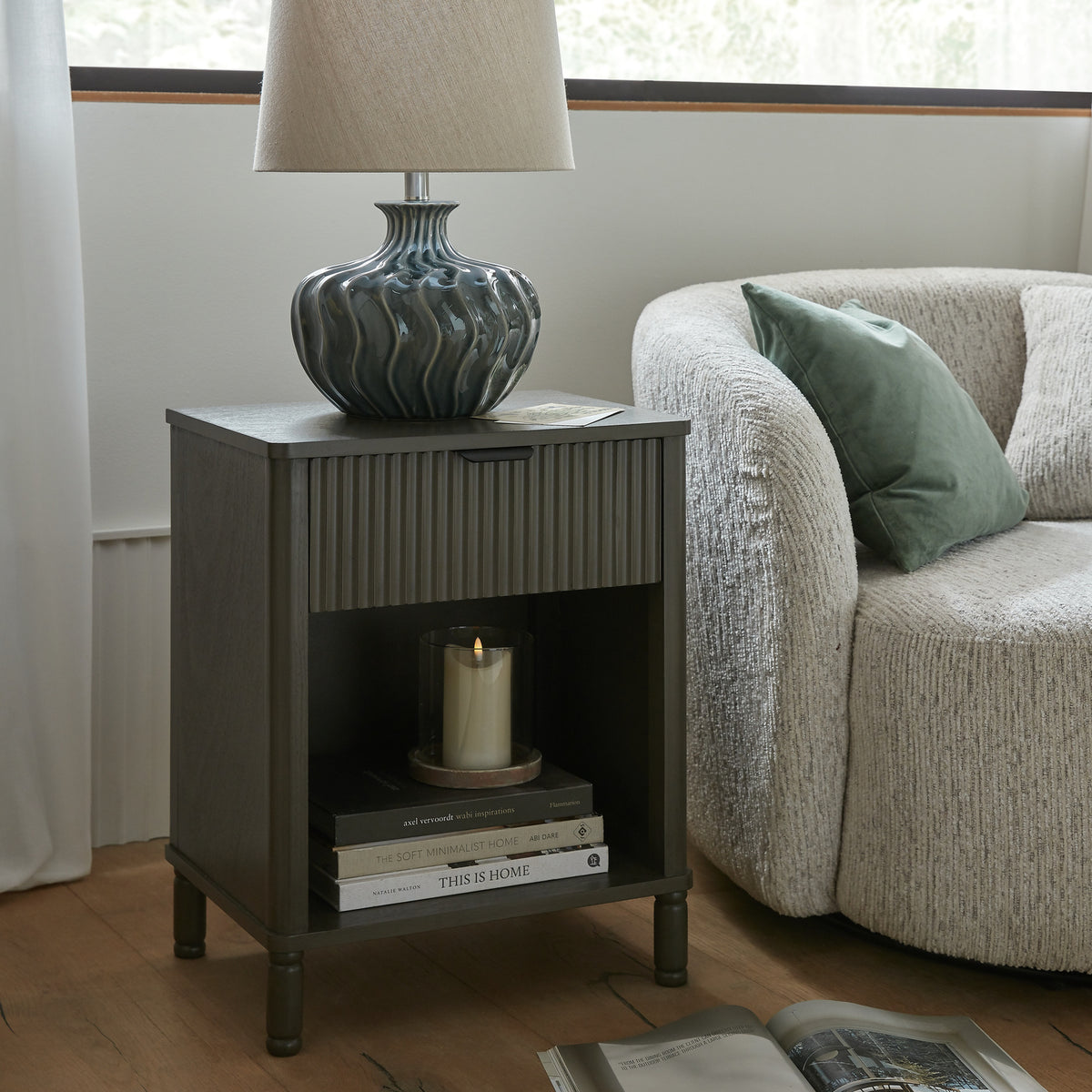 45 cm bedside table with a drawer and open shelf next to an armchair