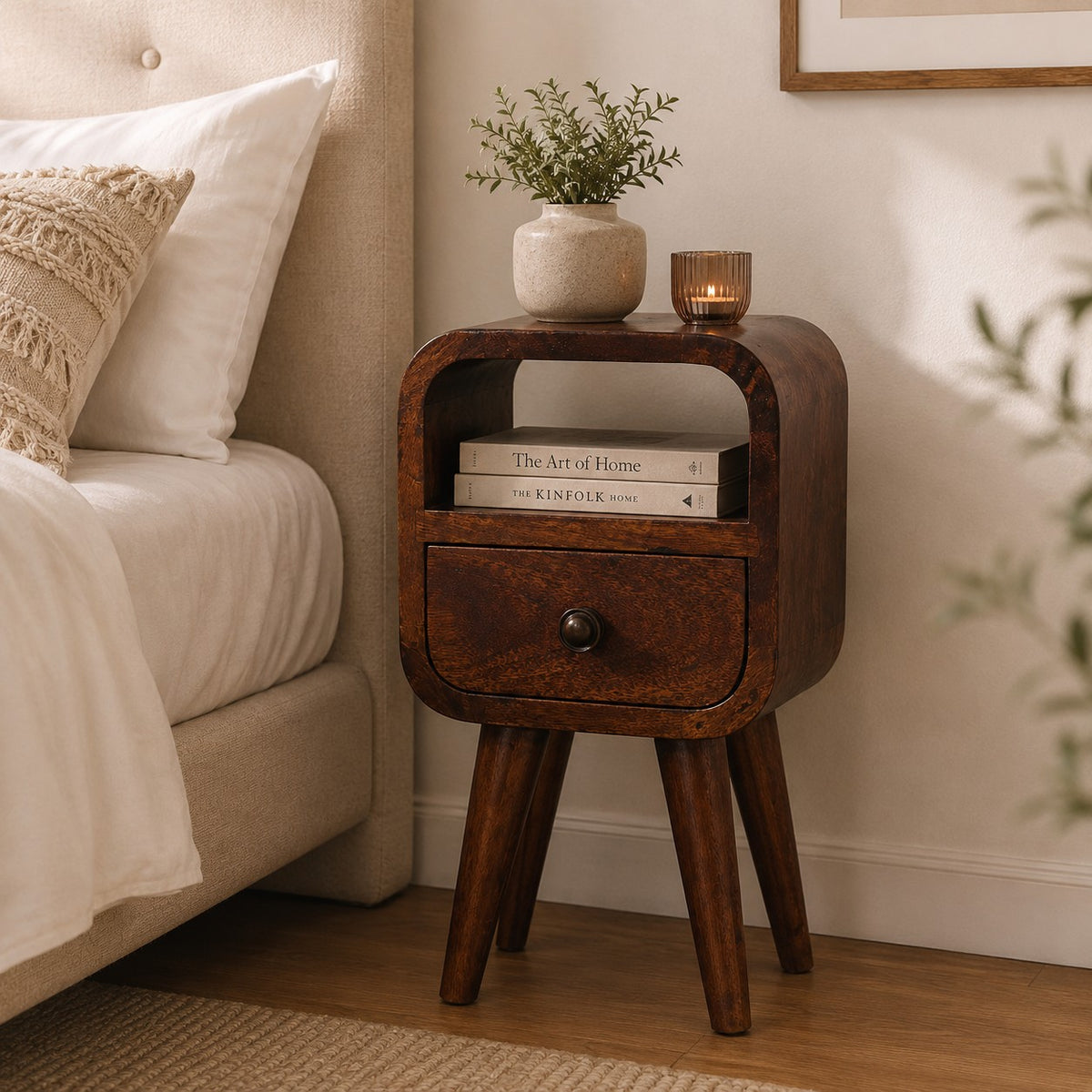 Narrow bedside table with drawer, 20 cm wide, chestnut brown, styled in a bedroom next to a bed