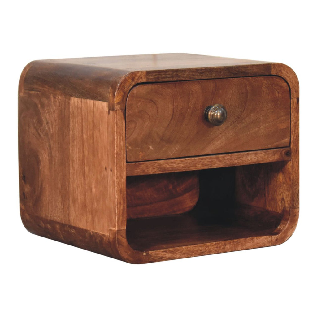 Wall-mounted bedside table, 30 cm wide, honey caramel tone, side angle showing the open slot below