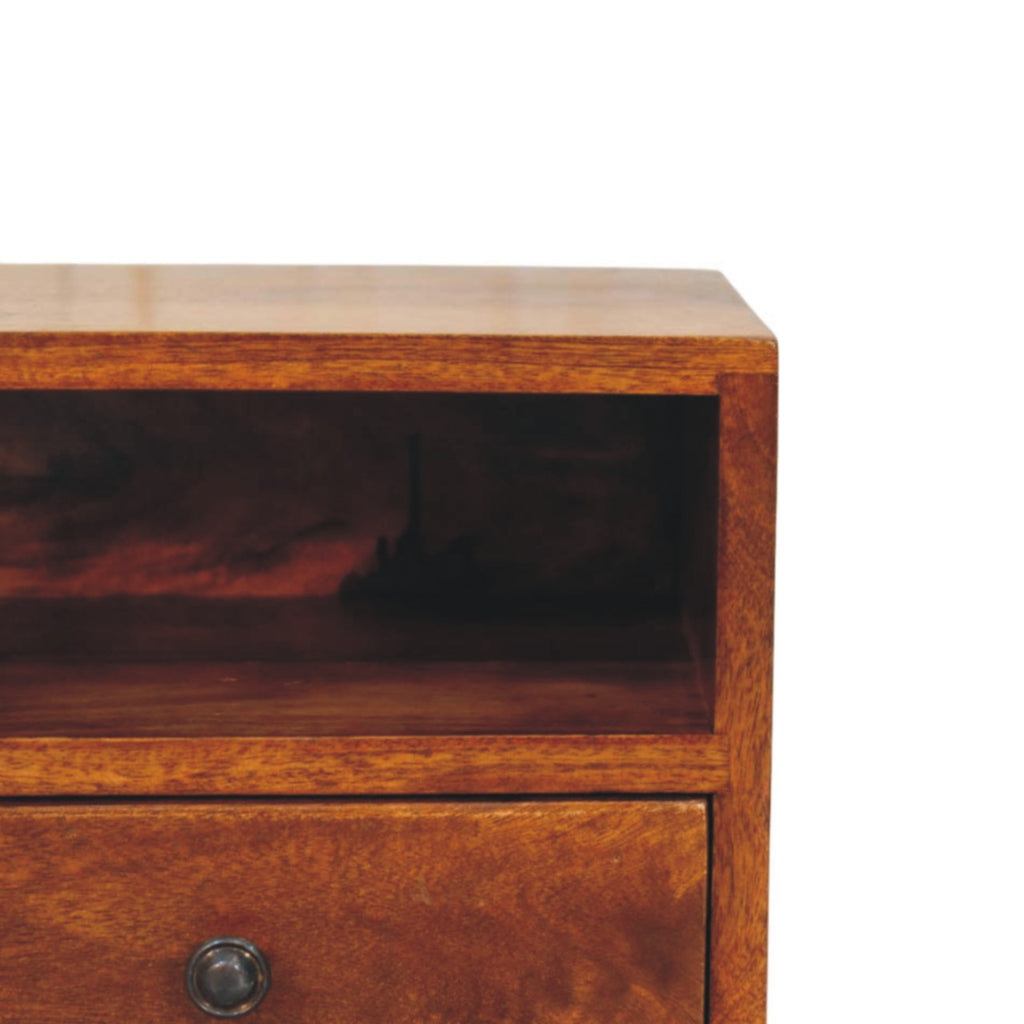 Close-up of the top corner and open shelf on a chestnut brown wall-mounted bedside table, 30 cm